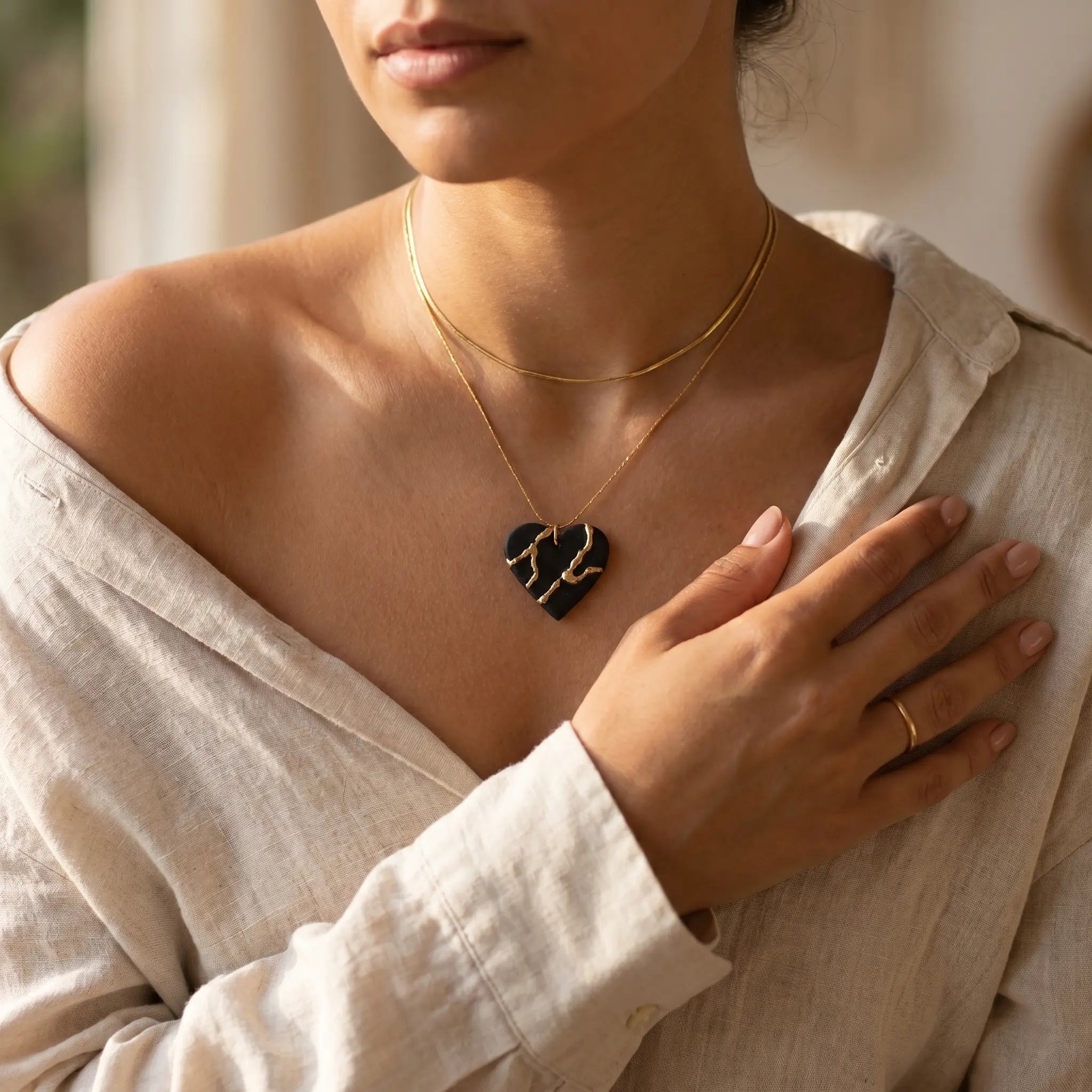 Collier cœur Kintsugi noir - Empreinte
